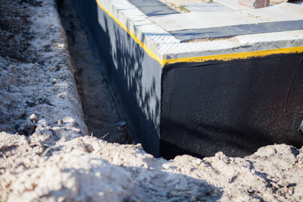 Professional Emergency Waterproofing technician working in Montgomeryville, PA